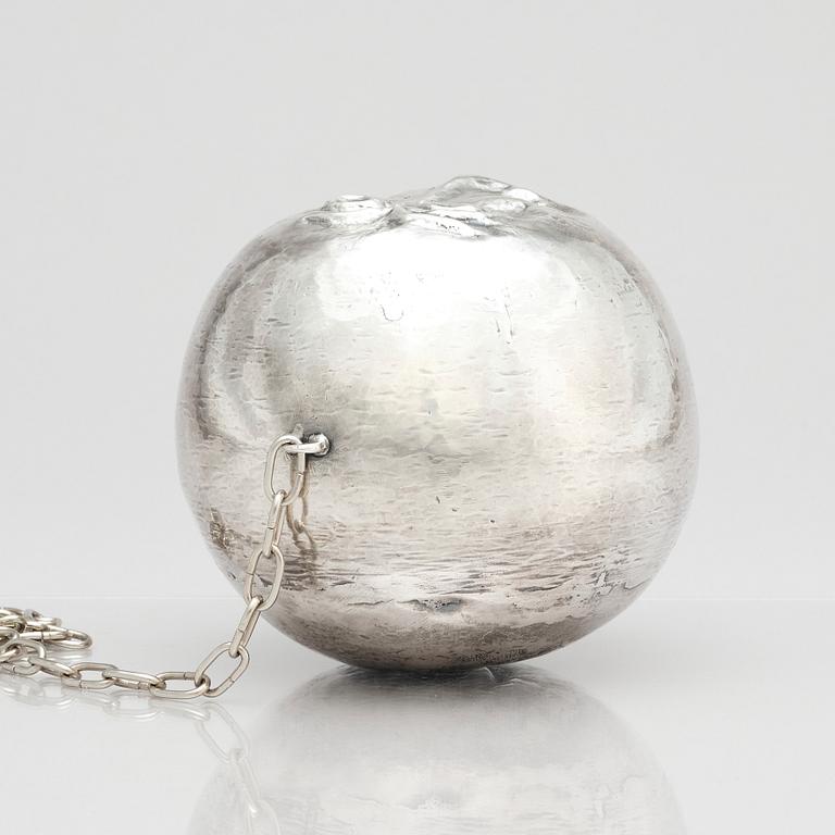 Olle Ohlsson, a silver 'man in the moon' sculpture, Stockholm.