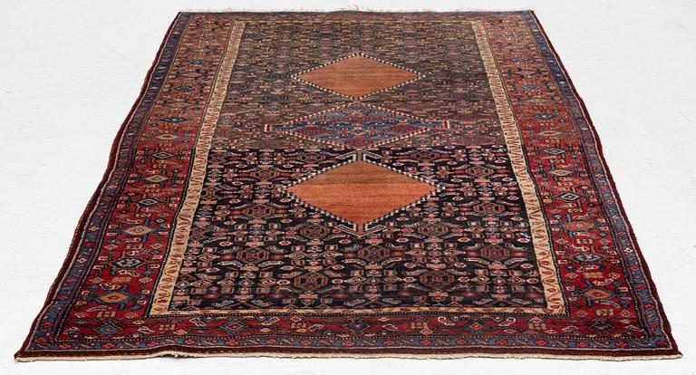 A semi-antique Bidjar rug, c. 255 x 135 cm.