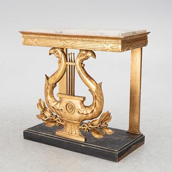 An Empire console table, first half of the 19th century.