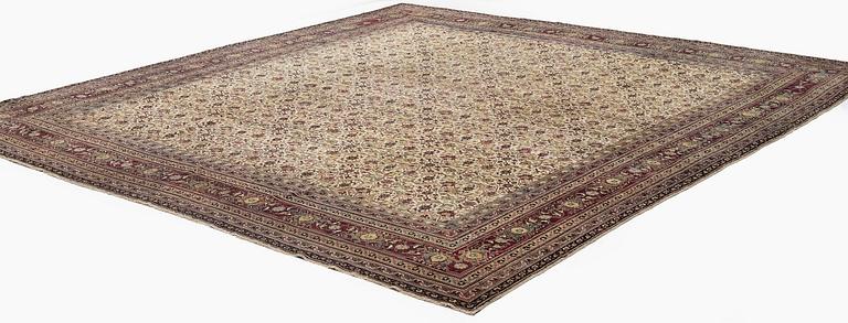 An antique Agra carpet, north India c. 430 x 392 cm.