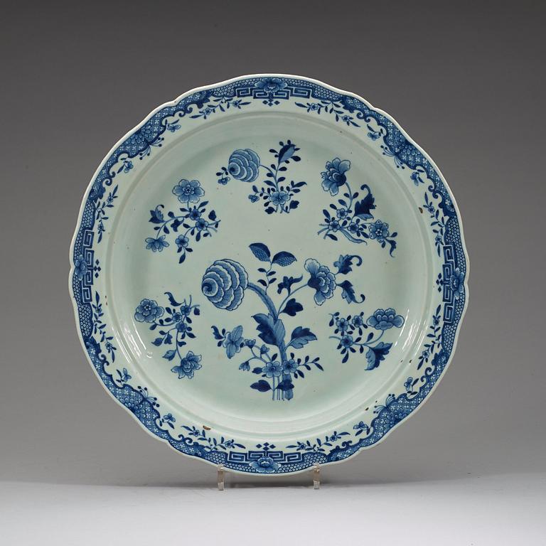 A pair of large blue and white serving dishes with strainers, Qing dynasty, Qianlong (1736-95).