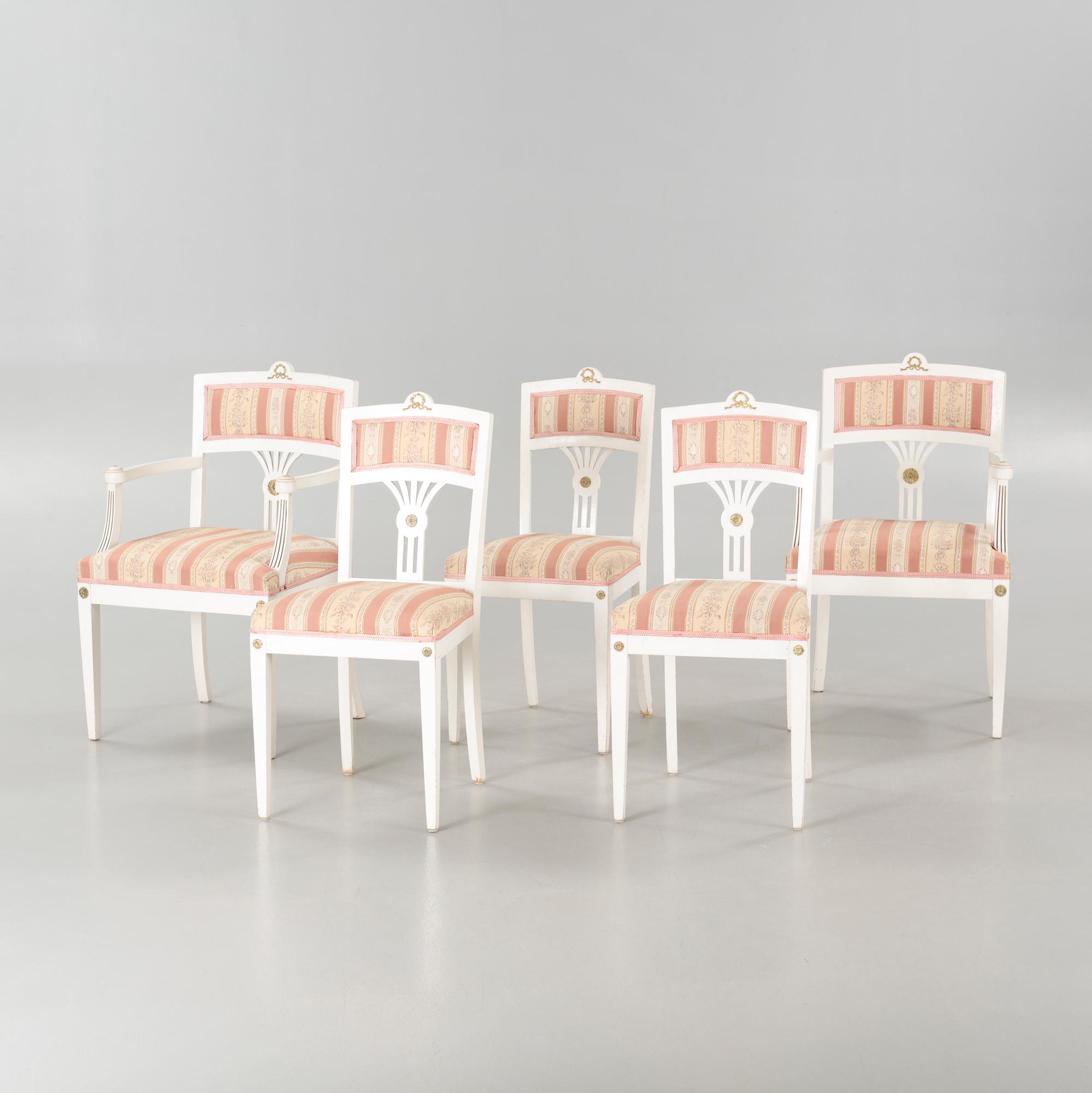 Two gustavian style armchairs and three chairs, first half of the 20th century.