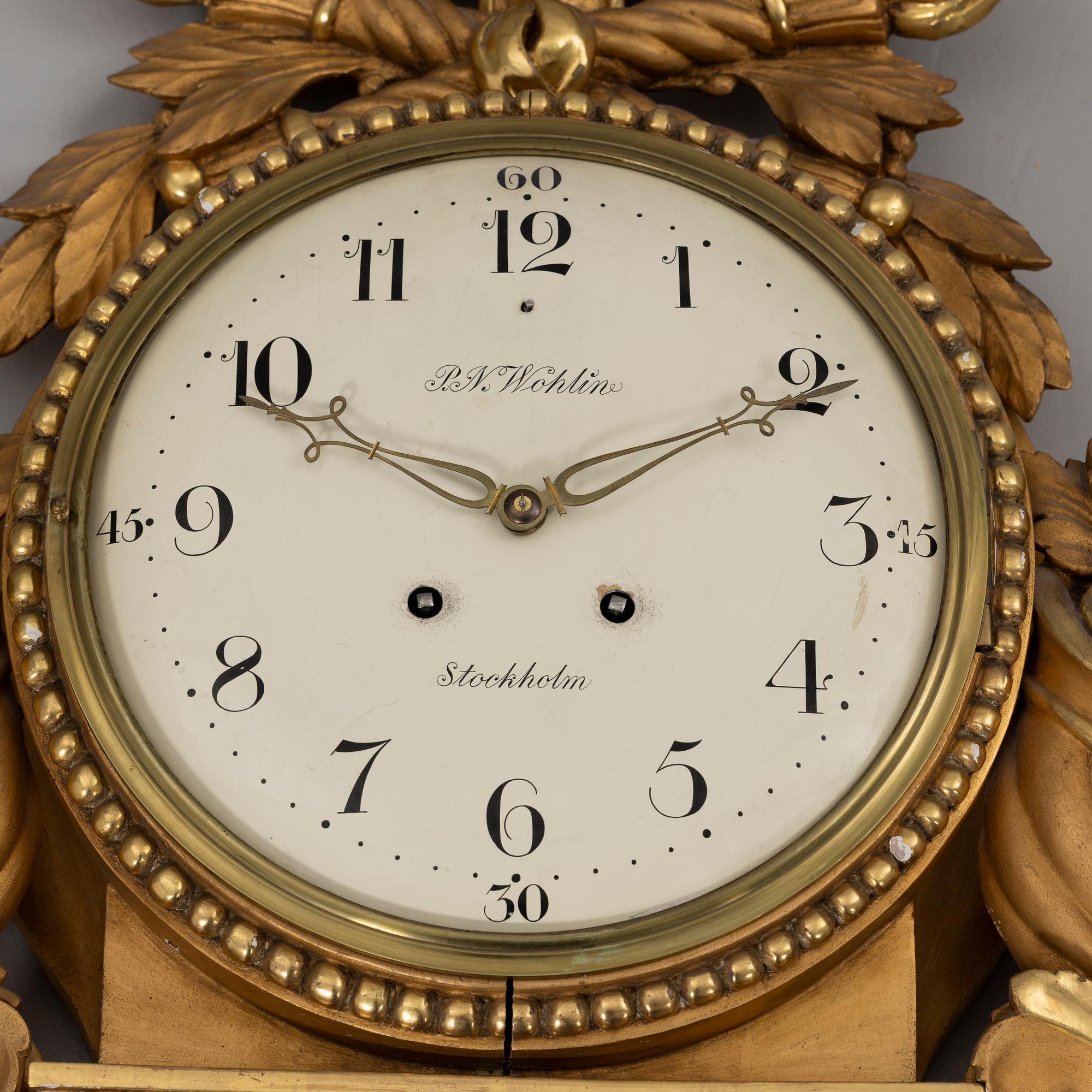 Wall clock, Gustavian style, P.N. Wohlin, Stockholm, 20th century.