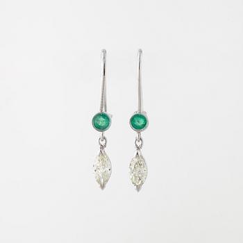 A pair of emerald and marquise cut diamond earrings.