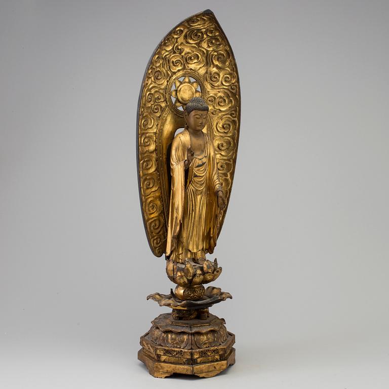 A large wooden lacquered figure of buddha, Japan, 19th Century.