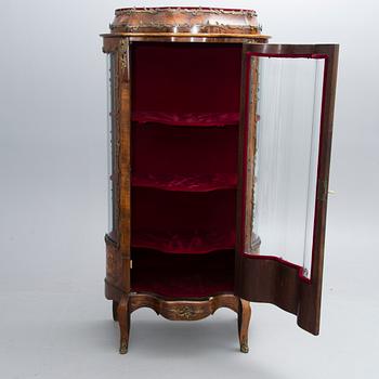 A late 19th French century display cabinet in Rococo style.