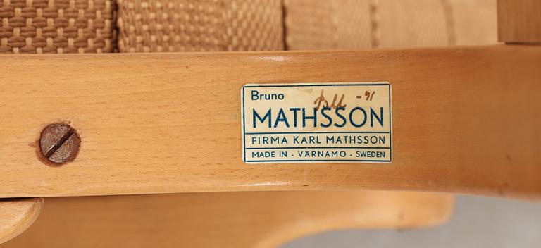 A Bruno Mathsson beech and paper webbing easy chair, Karl Mathsson, Värnamo 1940's.