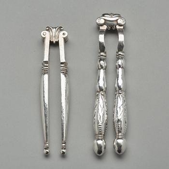 Georg Jensen, OCH JOHAN ROHDE, nötknäppare, 2 st, Firma Georg Jensen, Köpenhamn 1919-27, 830/1000.
