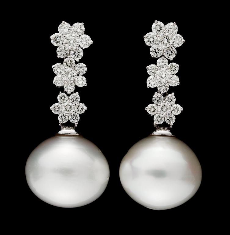 A pair of South Sea cultured pearl and diamond earrings.