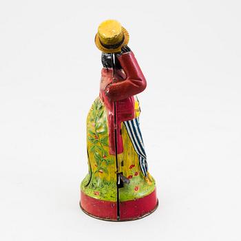 A tinplate coin bank by J. Levy & Co, England, probably of German manufacture, ca 1909.