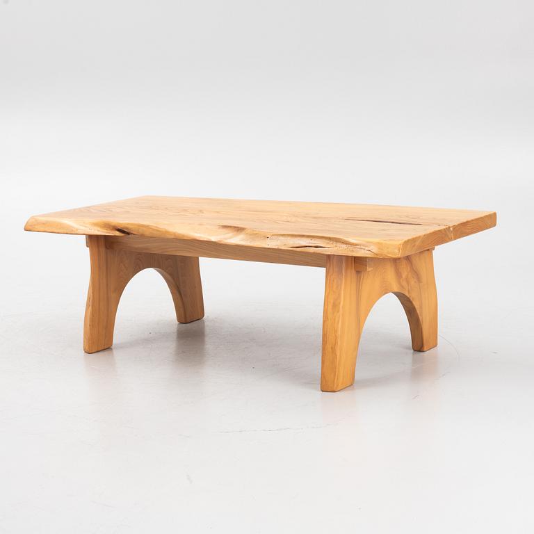 A solid elm coffee table, Söwe Konst, Sweden, dated 1977.