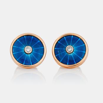 A pair of cufflinks, blue enamel and brilliant cut diamonds.