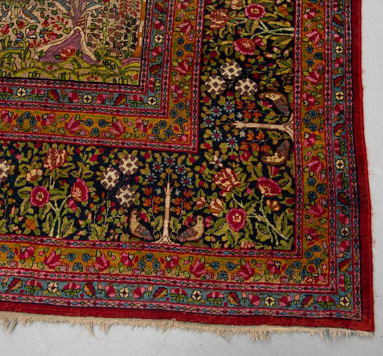 A CARPET, semi-antique Kerman, ca 360 x 284 cm.