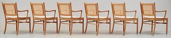A set of six Ole Wanscher cherry and ratten armchairs, PJ Jeppesen, Denmark, model PJ 301.