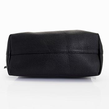 Prada, a leather bag.