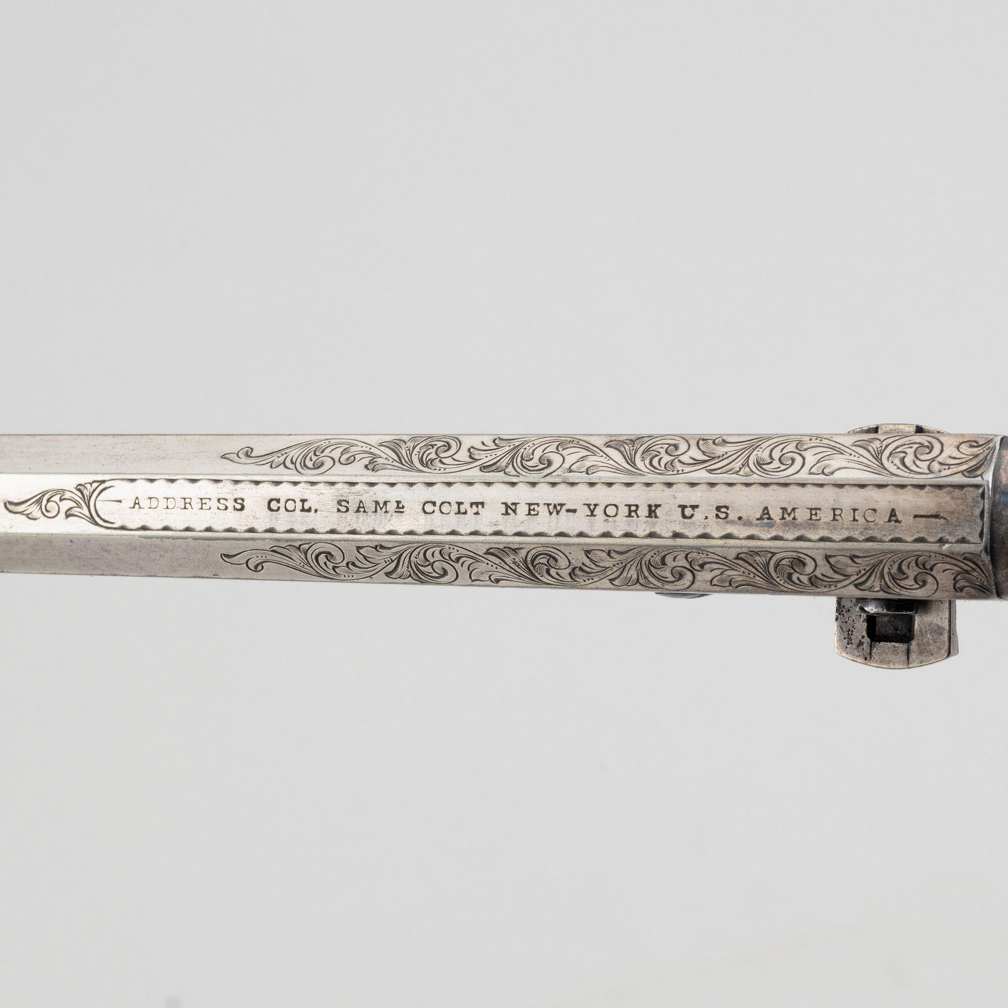 A percussion revolver, Colt 1851 Navy, in case, from the year 1863.