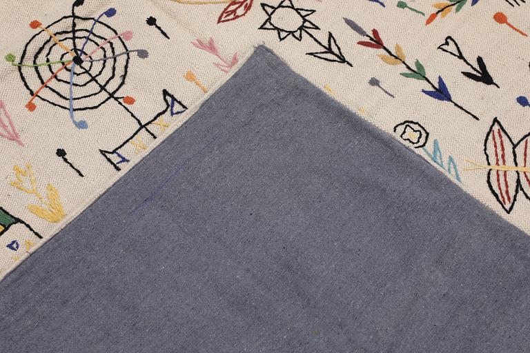 A Kelim carpet with hand-embroidered decoration, 239 x 182 cm.