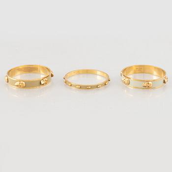 Alexander McQueen, three bracelets and a ring.