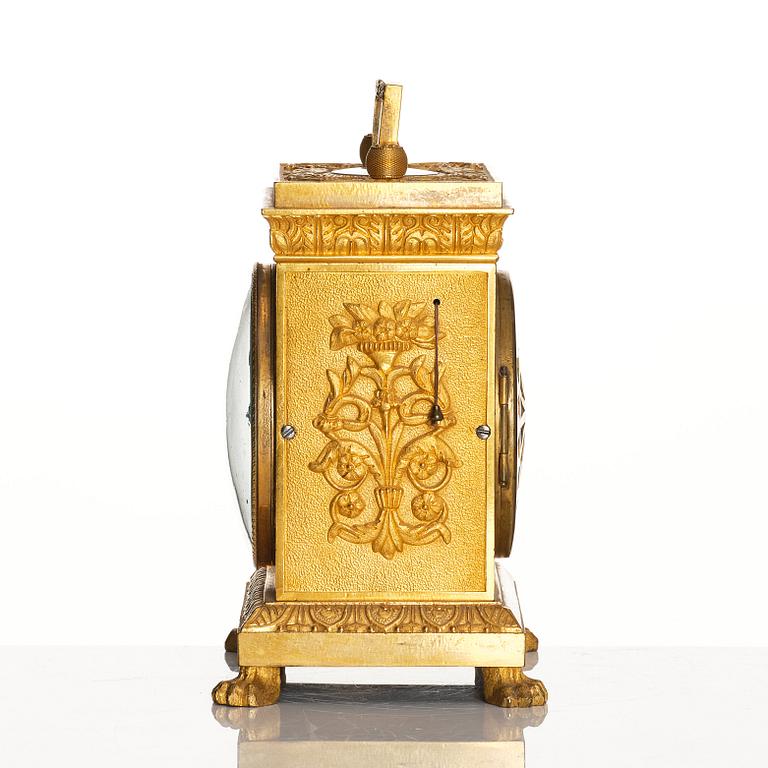 A late empire mantel clock, mid 19th century.