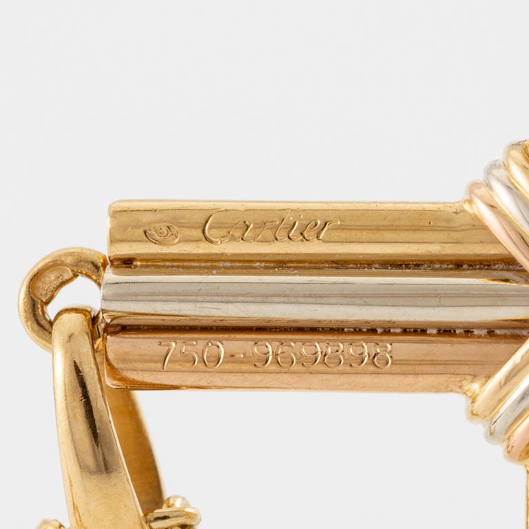 A Cartier necklace 18K multi-coloured gold "Trinity" cross.