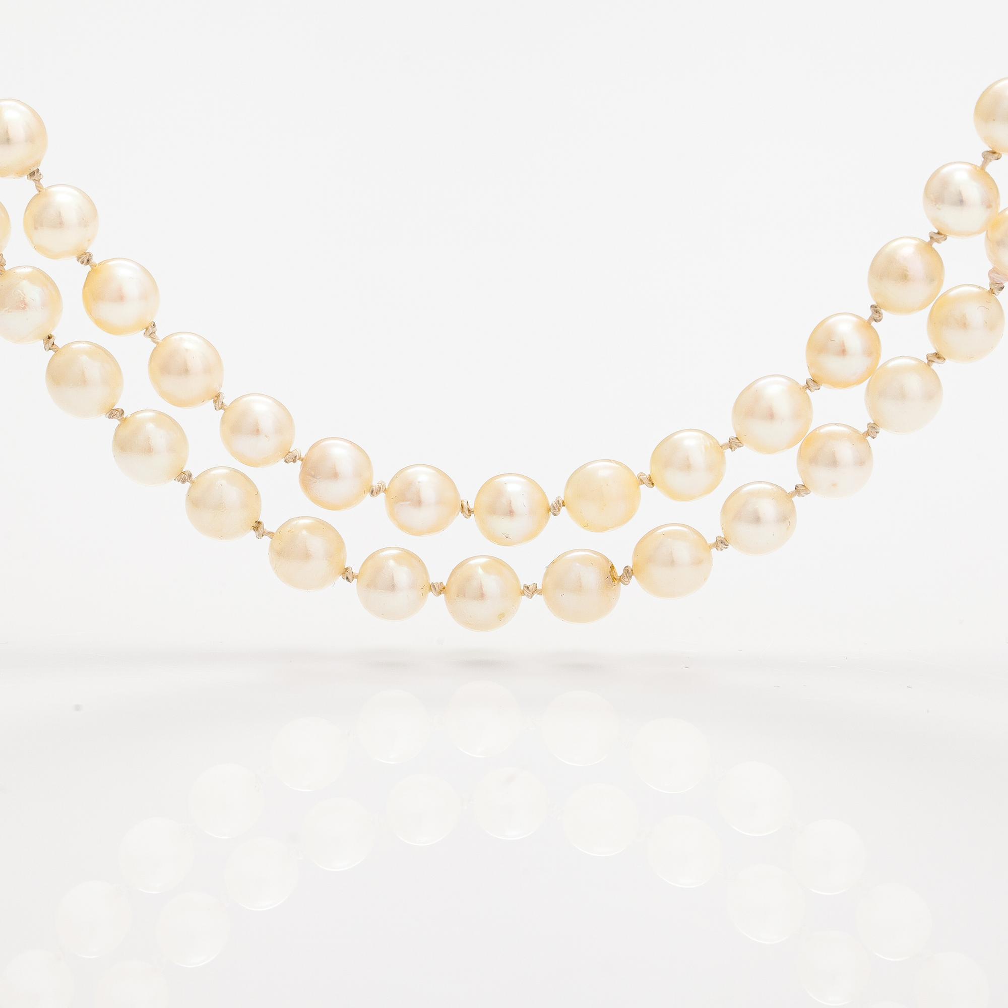 Two cultured pearl colliers without locks, silver parts. Probably Ole Lynggaard.