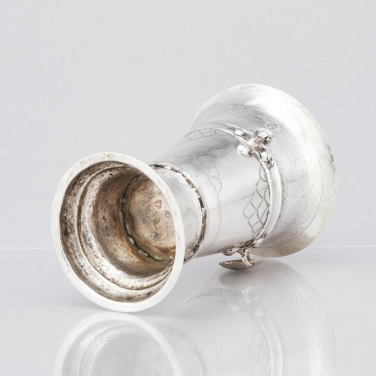 An 18th century silver beaker, unidentified makers mark.