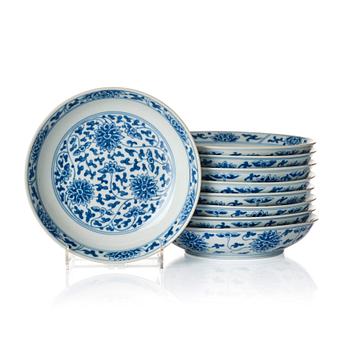 A set of nine blue and white lotus dishes, Qing dynasty with Daoguang seal mark.