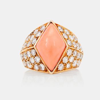 1062. A coral and brillant-cut diamond ring, total carat weight circa 2.00ct.