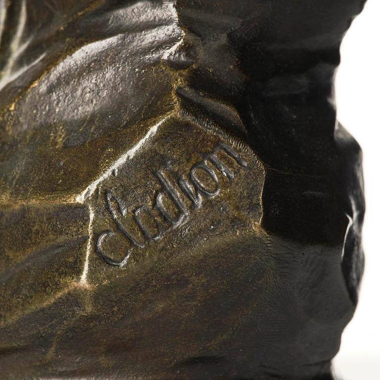 A pair of Louis XVI-style four-light gilt and patinated bronze candelabra after Clodion, later part 18th century.