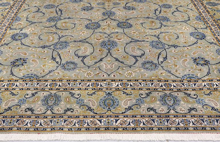 A Royal Keshan carpet, signed, 410 x 307 cm.