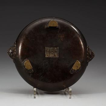 A large bronze tripod censer, Ming dynasty (1368-1644), with Xuande six character mark.