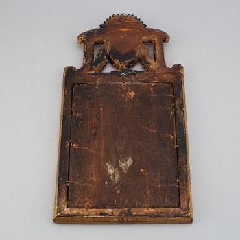 A Swedish 18th century gilt wood mirror.