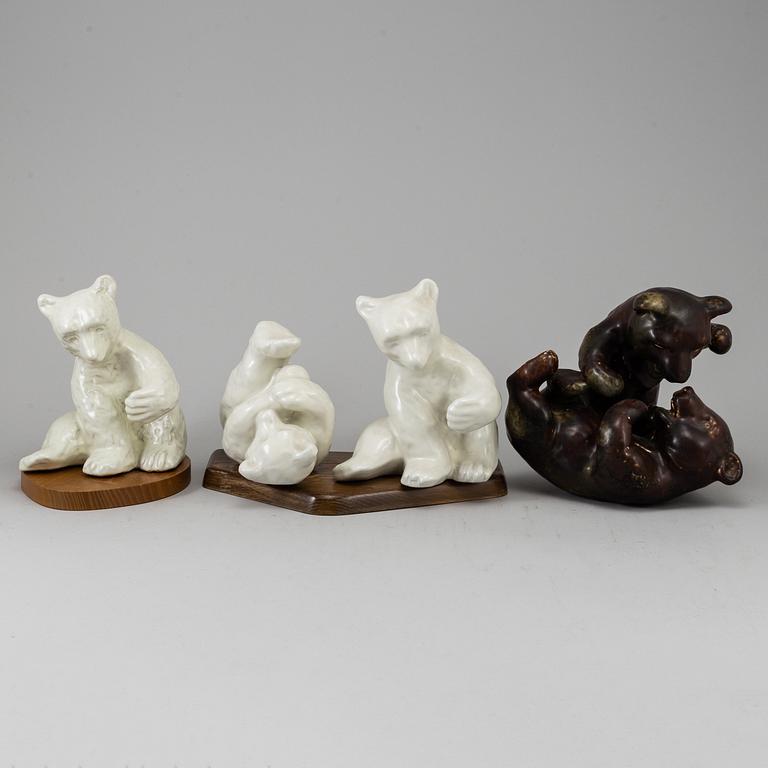 a set of three stoneware/ceramic figurines, including one by Karl Grössl.