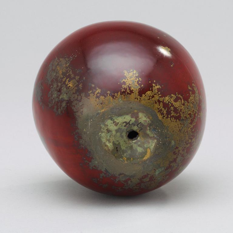 A Hans Hedberg faience apple, Biot, France.