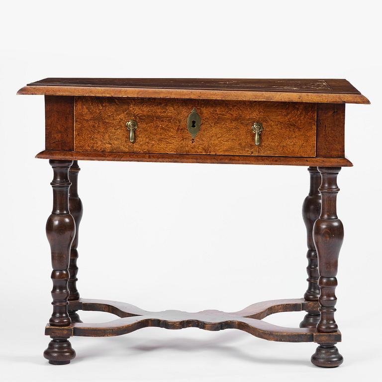 A Swedish late baroque burr-alder table, Stockholm, first part 18th century.