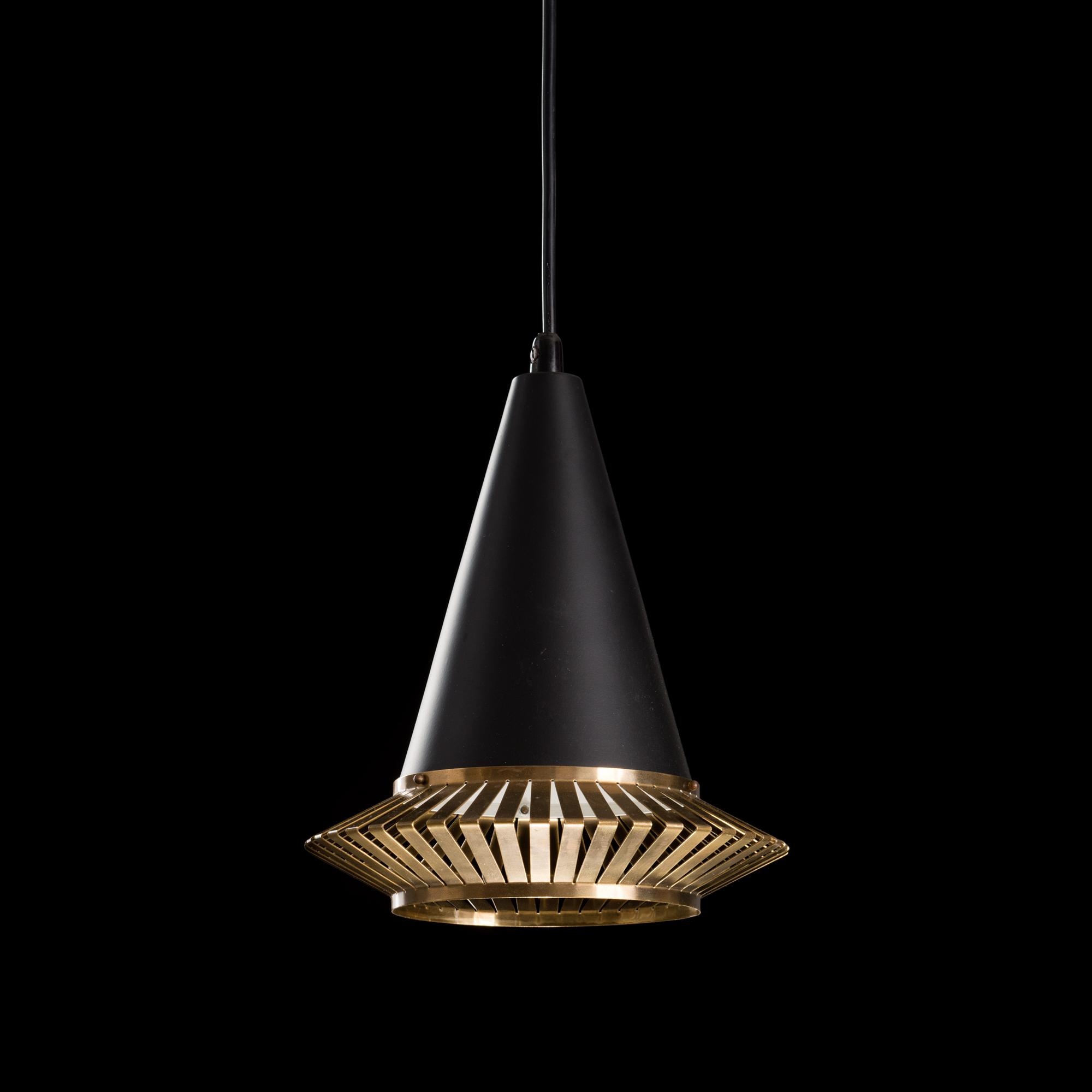 A No. K2-1 pendant stamped Idman.