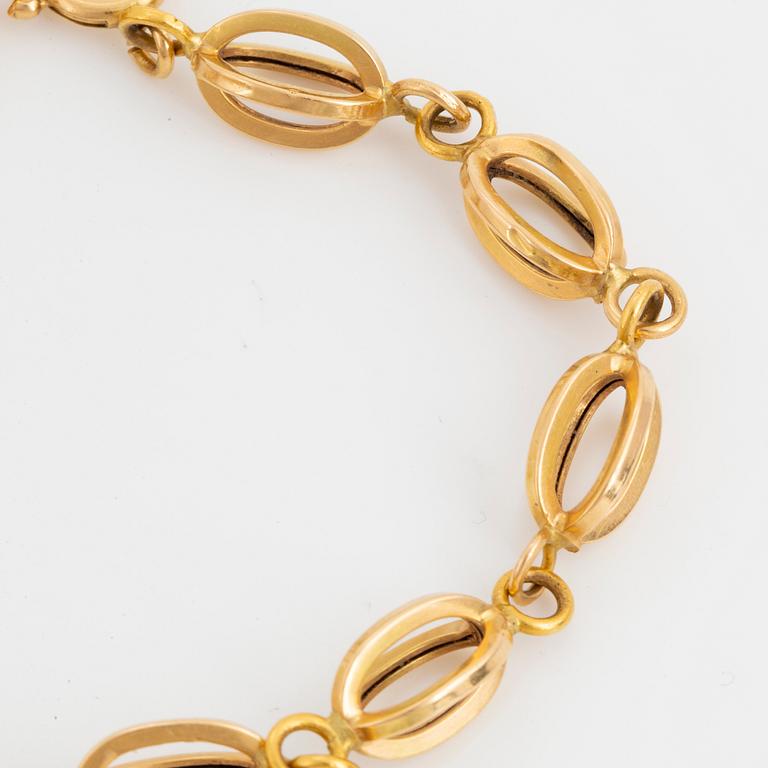 18K gold bracelet and necklace.