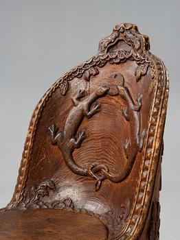 Knut Fjaestad, an Art Nouveau folk art sculptured pine chair, Sweden early 1900's.