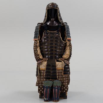 A Japanese suit of armor in the Tatami-Gusoho style, presumably mid Edo period.