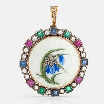 A 14K gold and silver pendant/medallion with enamel, rose cut diamonds ca. 1.00 ct, rubies, emeralds and sapphires.