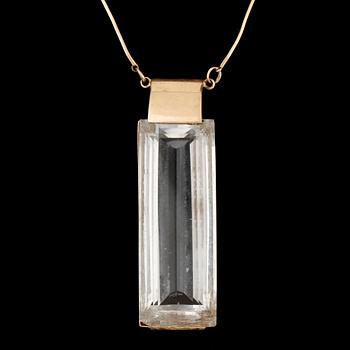 HALSSMYCKE, 18k guld med bergkristall, Stigbert, 1947. Totalvikt ca22g.
