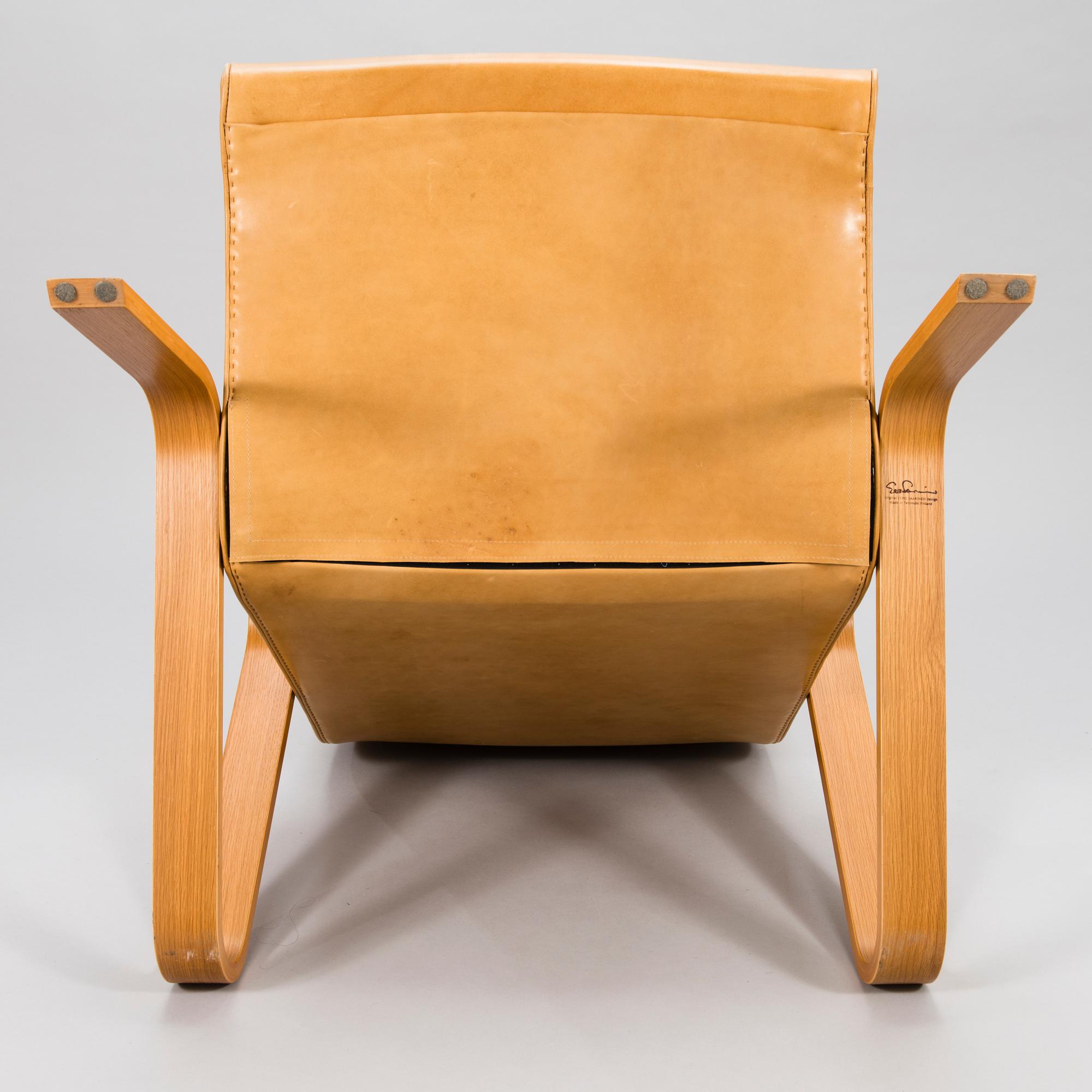 EERO SAARINEN, a 'Grasshopper' armchar and ottoman manufactured under licens by Tetrimäki Finland.