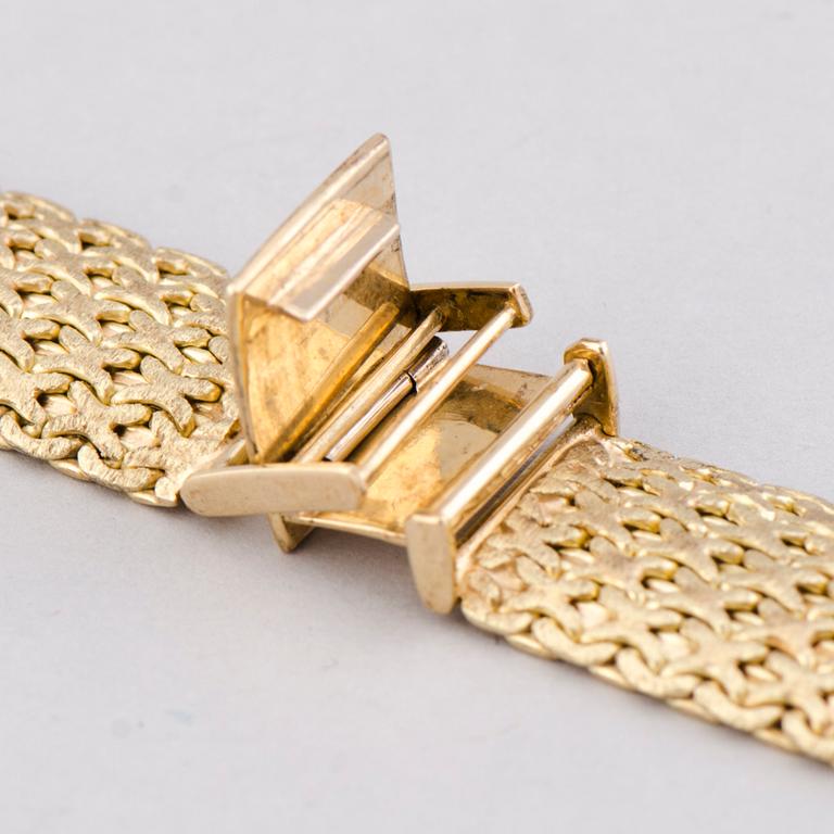 GULDLÄNK för ARMBANDSUR, 20 mm, 14K guld. Helsingfors 1969.
