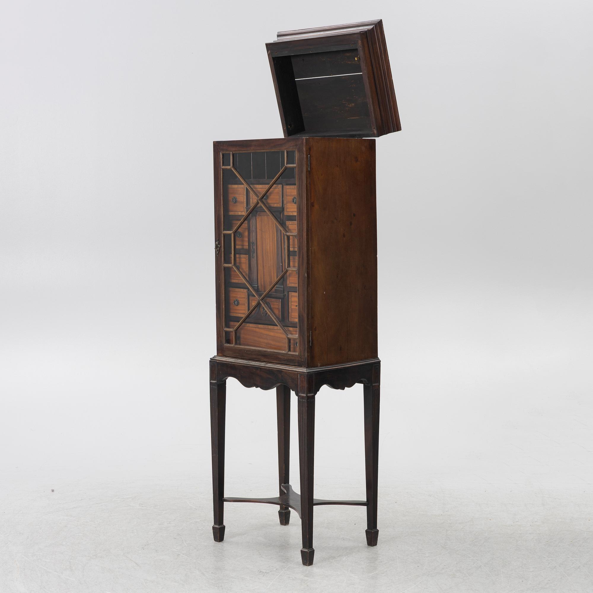 Display cabinet, likely England 19th century.