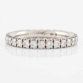 Cartier eternity ring in platinum with round brilliant-cut diamonds.
