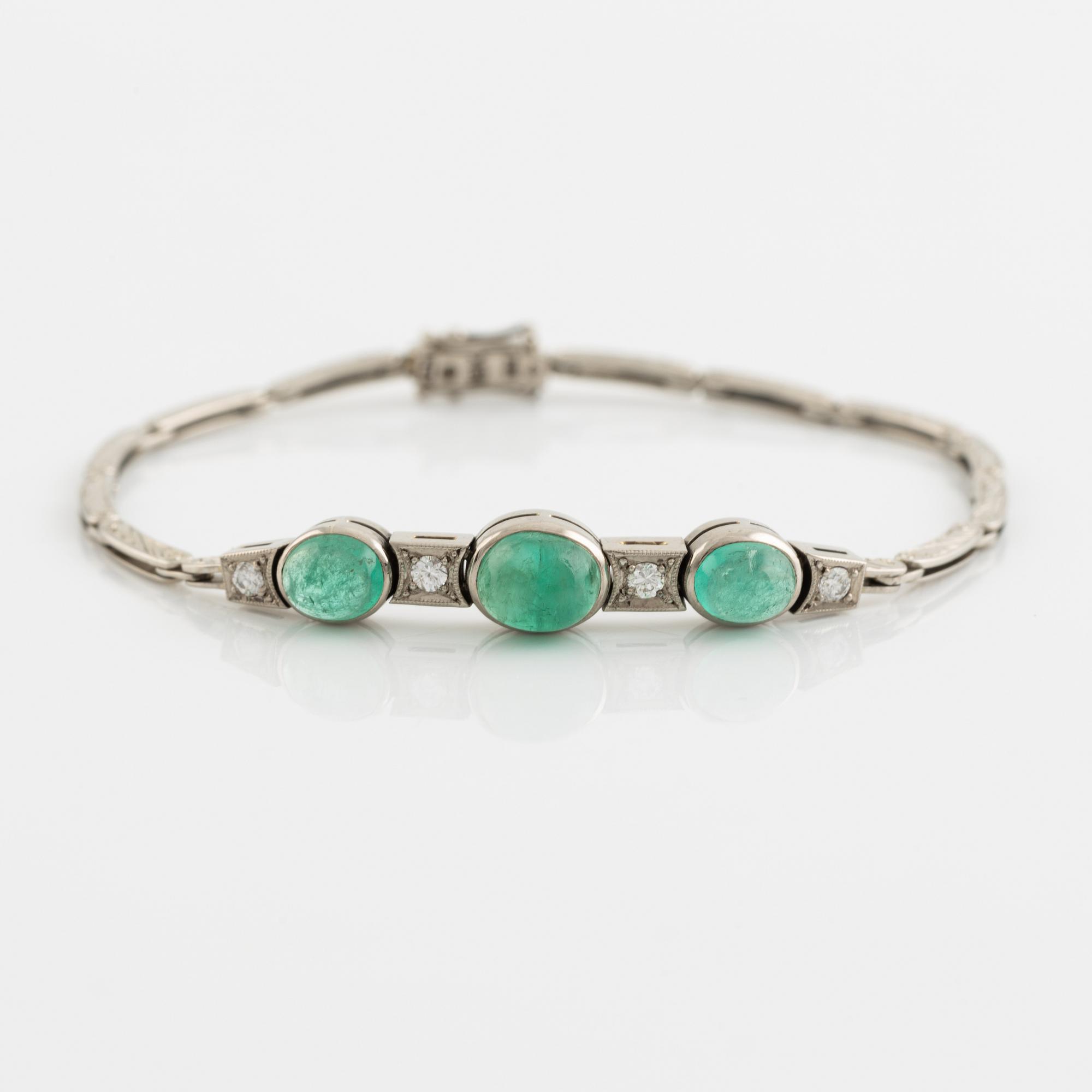 Cabochon cut emerald and brilliant cut diamond bracelet.