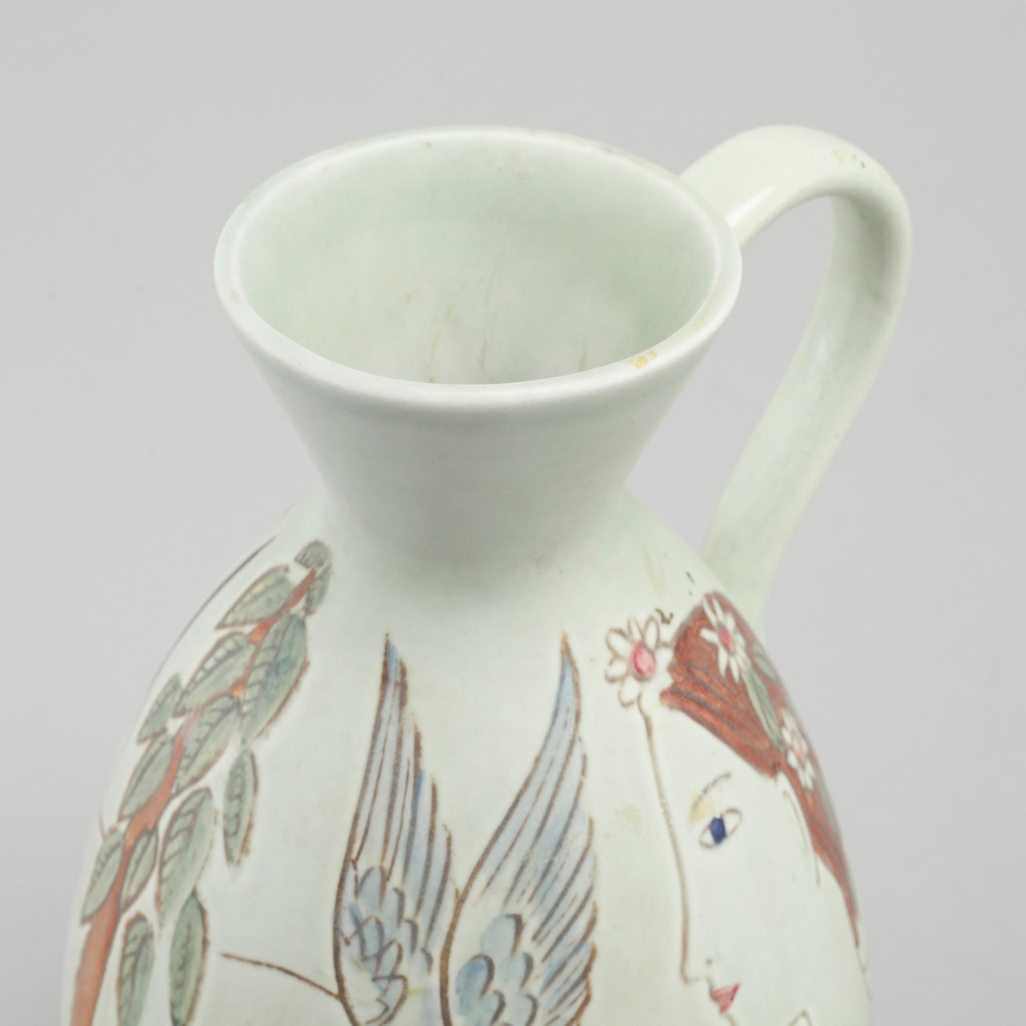 A stoneware dish and a jug for Rörstrand, stamp marked.