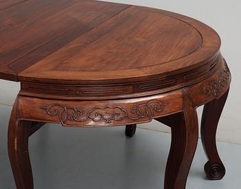 A hardwood dinner table, early 20th Century.