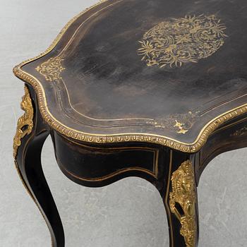 A Louis XV style table, early 20th Century.