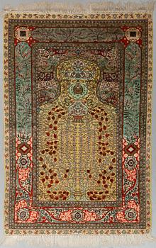 A CARPET, Oriental silk souf (relief), probably Chinese ca 184,5 x 124 cm.